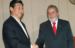 President Luiz Inacio Lula da Silva (L) met  Vice President Xi Jinping in Brasilia.
